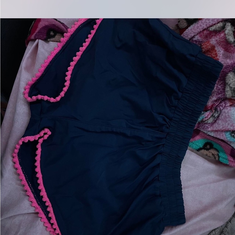 BRAND NEW LIMITED TOO SIZE 14/16 SWIM SHORTS
can be used as regular shorts too